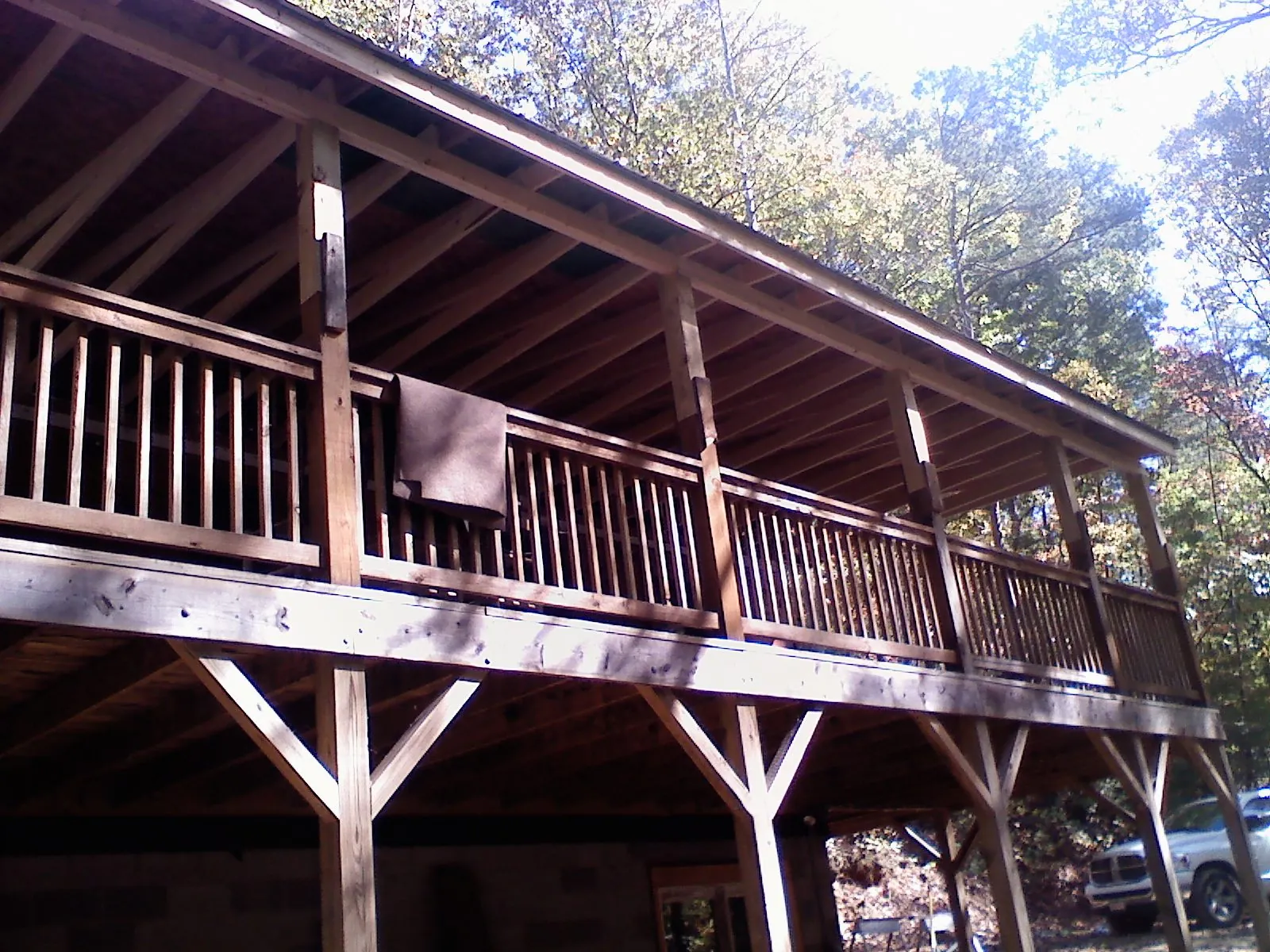 Timber framing under a new elevated porch and deck — Roof Leak Repair in Sperry by Roofing Brothers